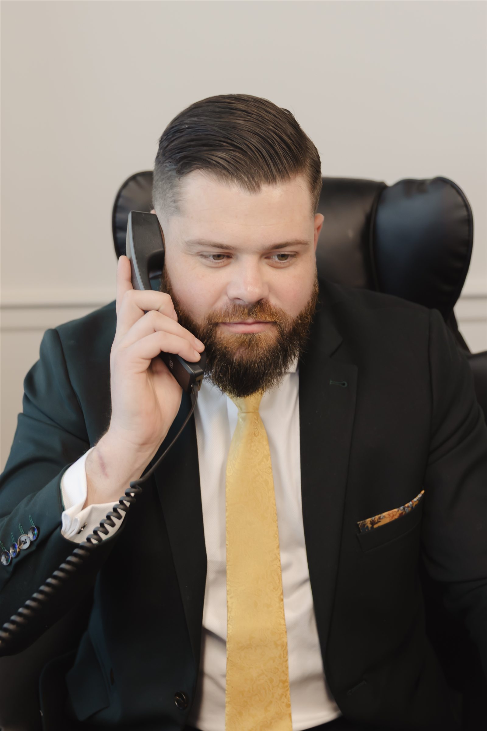 Bart Denham taking a call at his desk